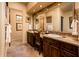 Bathroom with double vanity and large mirror at 27440 N Alma School Pkwy # 33-1, Scottsdale, AZ 85262