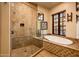 Spa-like bathroom with soaking tub and walk-in shower at 27440 N Alma School Pkwy # 33-1, Scottsdale, AZ 85262