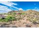 Aerial view showcasing a community of luxury homes and desert landscape at 27440 N Alma School Pkwy # 33-1, Scottsdale, AZ 85262