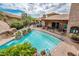 Community pool and spa with surrounding landscaping at 27440 N Alma School Pkwy # 33-1, Scottsdale, AZ 85262