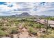Aerial view of community with mountain and desert landscape at 27440 N Alma School Pkwy # 33-1, Scottsdale, AZ 85262
