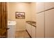 Bright laundry room with washer, dryer, and countertop at 27440 N Alma School Pkwy # 33-1, Scottsdale, AZ 85262