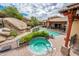 Resort-style pool and spa with mountain views at 27440 N Alma School Pkwy # 33-1, Scottsdale, AZ 85262