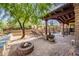 Relaxing patio area with fire pit and ample seating at 27440 N Alma School Pkwy # 33-1, Scottsdale, AZ 85262