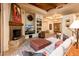 Spacious living room features a fireplace, large TV, and comfortable seating at 27440 N Alma School Pkwy # 33-1, Scottsdale, AZ 85262