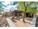 Spacious patio with fire pit and lounge chairs at 27440 N Alma School Pkwy # 33-1, Scottsdale, AZ 85262