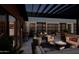 Evening view of a relaxing terrace with pergola and seating at 19360 N 73Rd St # 1076, Scottsdale, AZ 85255