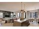 Open-concept living space with kitchen island and dining area at 19360 N 73Rd St # 1076, Scottsdale, AZ 85255