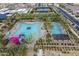 Aerial view of community pool with water slides at 10013 E Trent Ave, Mesa, AZ 85212