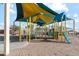 Modern playground structure with shade coverings at 38075 W Excussare Way, Maricopa, AZ 85138