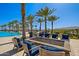 Community pool with fire pit and comfortable seating at 17197 W Thousand Oaks St, Surprise, AZ 85388