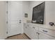 Bright and spacious pantry with custom cabinetry and chalkboard at 17197 W Thousand Oaks St, Surprise, AZ 85388