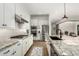 Modern kitchen with granite countertops and stainless steel appliances at 17197 W Thousand Oaks St, Surprise, AZ 85388