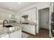 Modern kitchen with granite countertops and stainless steel appliances at 17197 W Thousand Oaks St, Surprise, AZ 85388