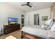 Bedroom with dresser and ensuite bathroom access at 17197 W Thousand Oaks St, Surprise, AZ 85388