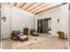 Inviting courtyard with comfortable seating and a sliding barn door at 17197 W Thousand Oaks St, Surprise, AZ 85388