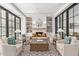 Elegant community lobby with fireplace and comfortable seating at 17197 W Thousand Oaks St, Surprise, AZ 85388