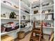 Well-organized pantry with ample shelving for storage at 17197 W Thousand Oaks St, Surprise, AZ 85388