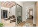 Relaxing covered patio with seating area and access to interior at 17197 W Thousand Oaks St, Surprise, AZ 85388