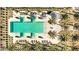 Community pool with surrounding deck and lounge chairs at 17197 W Thousand Oaks St, Surprise, AZ 85388
