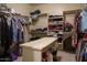 Large walk-in closet with ample shelving and hanging space at 2541 E Carob Dr, Gilbert, AZ 85298