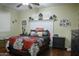 Bedroom with wood floors and a stylish headboard at 2541 E Carob Dr, Gilbert, AZ 85298