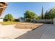 Large backyard with a shed, patio, and plenty of grass at 809 W Lindner Ave, Mesa, AZ 85210