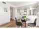 Modern white kitchen with stainless steel appliances at 840 E Morningside Dr, Phoenix, AZ 85022