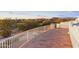 Private deck with curved design and white railings at 29808 N 63Rd St, Cave Creek, AZ 85331