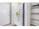 Clean bathroom with shower and shelving at 36063 W San Alvarez Ave, Maricopa, AZ 85138