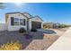 House exterior with landscaping and street view at 36063 W San Alvarez Ave, Maricopa, AZ 85138