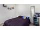 Bedroom with mini-fridge and shelving at 36063 W San Alvarez Ave, Maricopa, AZ 85138