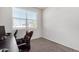 Home office with window, desk, and comfortable office chair at 36063 W San Alvarez Ave, Maricopa, AZ 85138