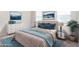 Bright bedroom with a cozy atmosphere and stylish decor at 36063 W San Alvarez Ave, Maricopa, AZ 85138