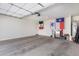 Spacious garage with ample space for storage and two vehicles at 36063 W San Alvarez Ave, Maricopa, AZ 85138