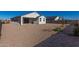 Spacious backyard with gravel and some small plants at 36063 W San Alvarez Ave, Maricopa, AZ 85138