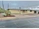 Tan single story home with attached garage and small front yard at 5522 E Colby St, Mesa, AZ 85205