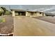 Long driveway leading to a single-story home's garage at 5522 E Colby St, Mesa, AZ 85205