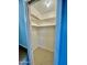 Small pantry with white shelves at 5522 E Colby St, Mesa, AZ 85205