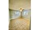 Spacious bedroom with tile floors and a ceiling fan at 5522 E Colby St, Mesa, AZ 85205