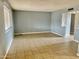 Spacious living room with light-grey walls and tile flooring at 5522 E Colby St, Mesa, AZ 85205