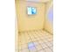 Finished bonus room with tile flooring and window at 5522 E Colby St, Mesa, AZ 85205