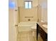 Bathroom with granite vanity and tiled shower/tub at 5522 E Colby St, Mesa, AZ 85205