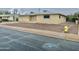 Ranch-style home with a front yard and driveway at 5522 E Colby St, Mesa, AZ 85205