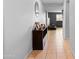 Inviting hallway with tile floors and storage cabinet at 8915 S 255Th Dr, Buckeye, AZ 85326