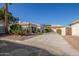 Single-story home with a two-car garage and nicely landscaped yard at 11544 W Javelina Ct, Surprise, AZ 85378