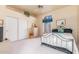 Bright bedroom with a comfortable bed and ample closet space at 11544 W Javelina Ct, Surprise, AZ 85378