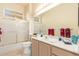 Clean bathroom with a tub shower combo and updated fixtures at 11544 W Javelina Ct, Surprise, AZ 85378