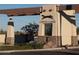 Coyote Lakes community entrance with stone and wood accents at 11544 W Javelina Ct, Surprise, AZ 85378