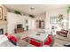 Living room with fireplace, tiled floors and lots of natural light at 11544 W Javelina Ct, Surprise, AZ 85378